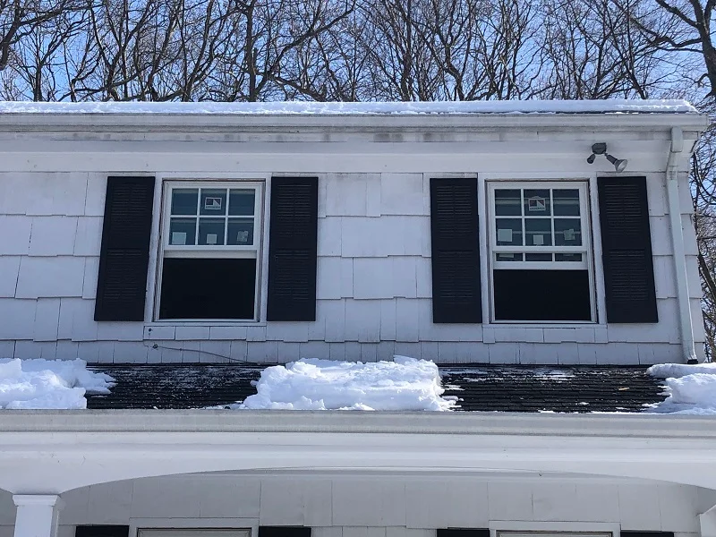 Andersen windows being installed in a Wilton, CT colonial home